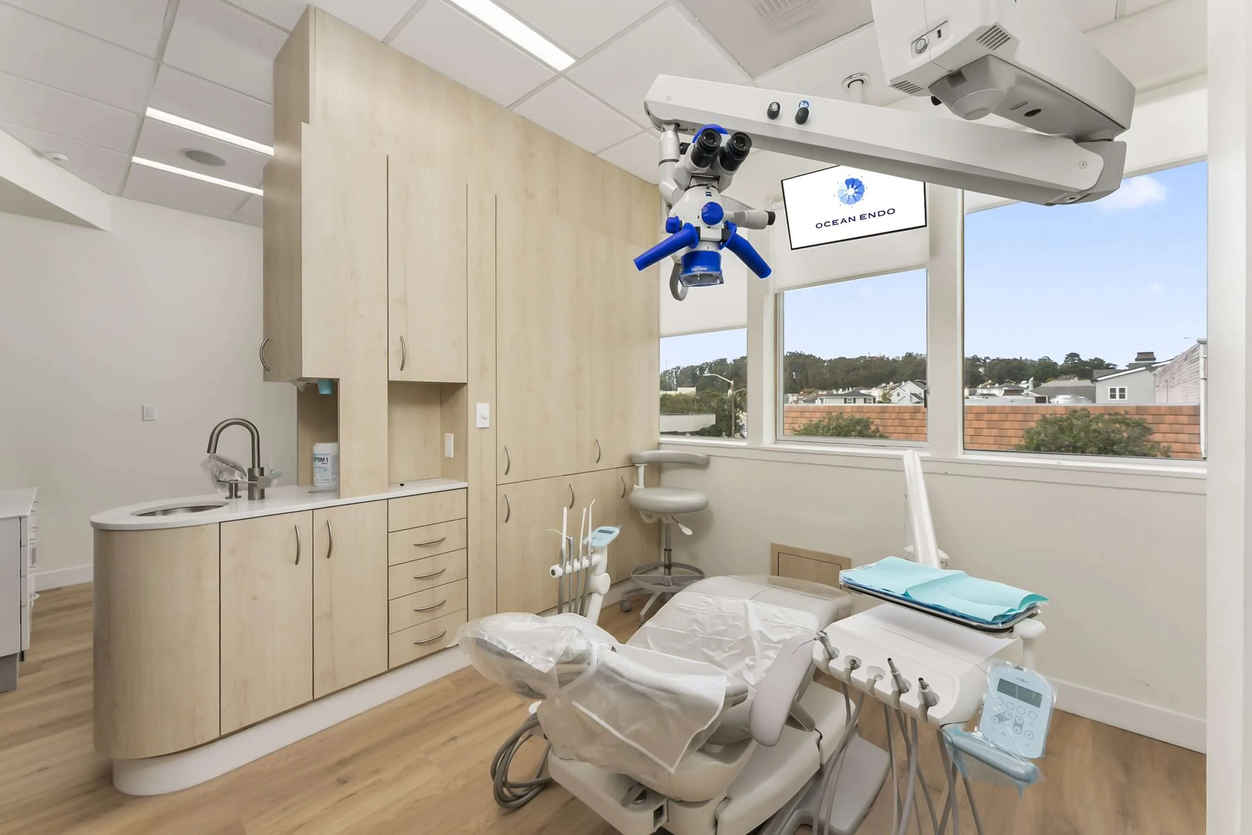 A treatment room with the operating microscope and neighborhood views